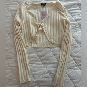 Cream cropped sweater with front tie